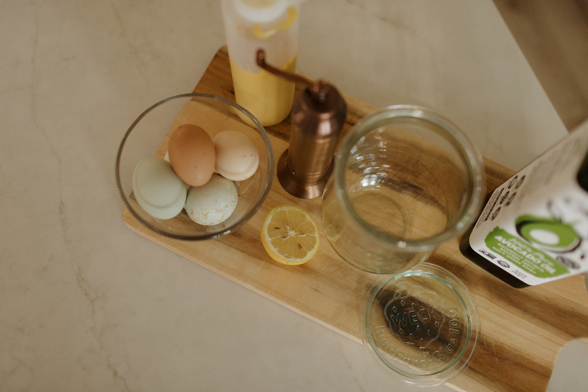 Eggs, lemon and oil on a wooden board in Abbie’s kitchen